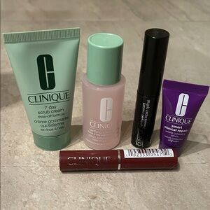 Clinique Skincare and Makeup Essentials with Red and Purple Accents